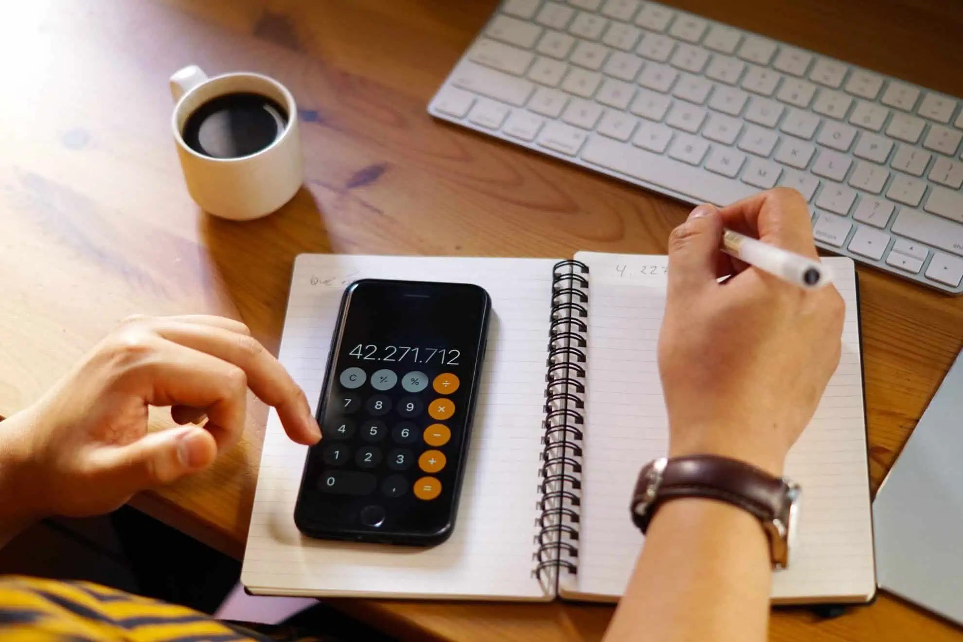 closeup shot entrepreneur working from home doing calculations scaled | Taxwise Australia | (08) 9248 8124