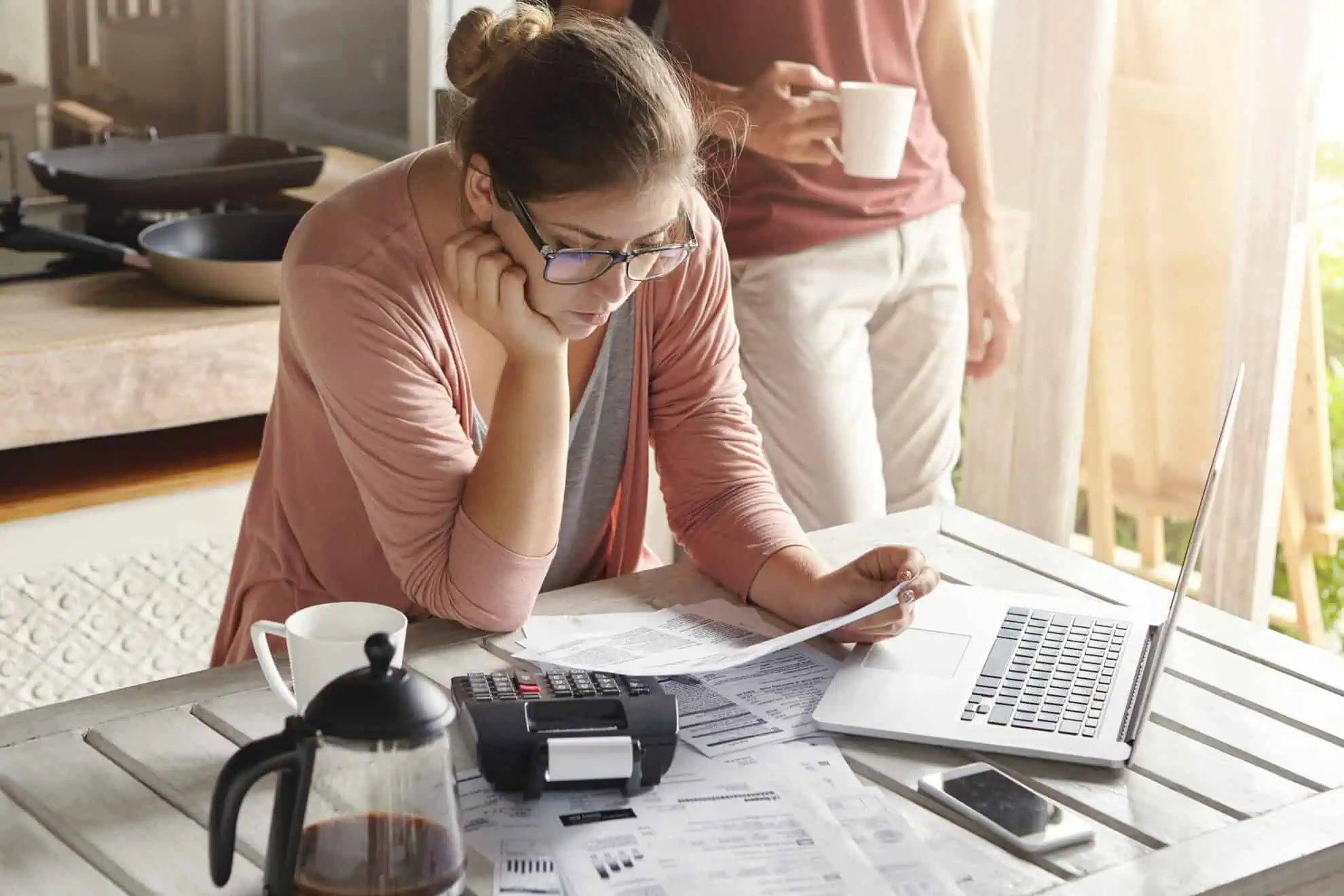 young housewife dressed casually focused paperwork scaled | Taxwise Australia | (08) 9248 8124